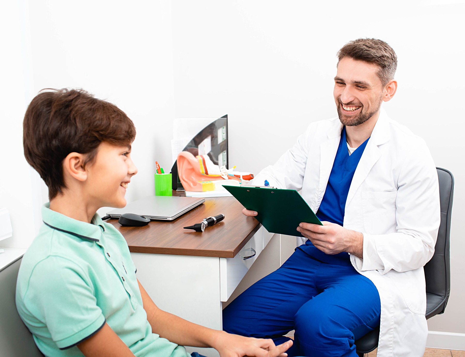 Boy visits a doctor audiologist.