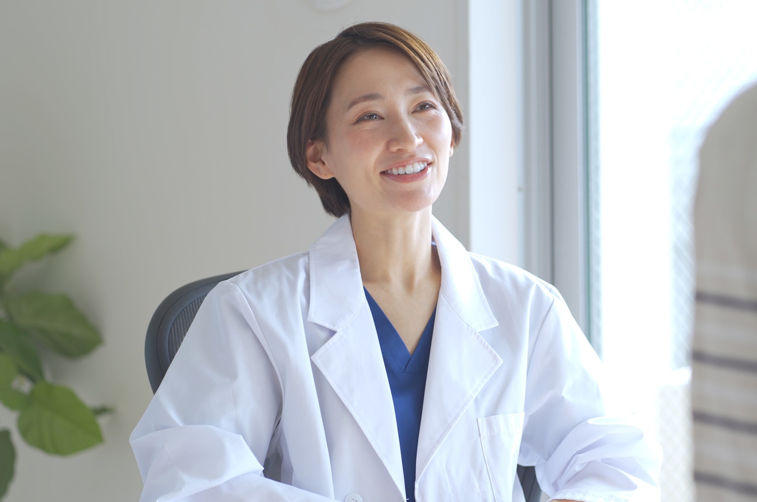 Japanese female medical worker examining a patient