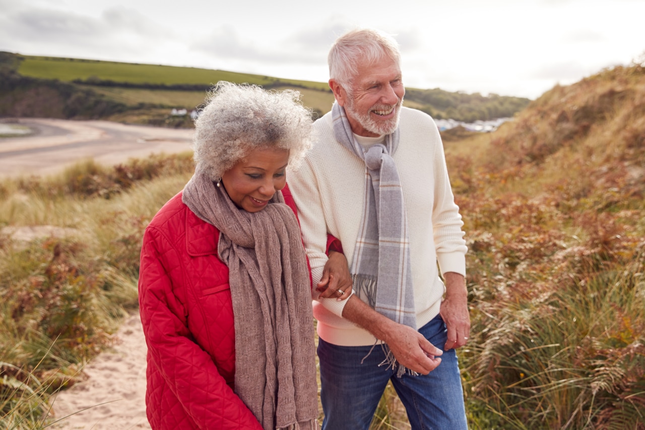 A senior couple walking outdoors A mature couple walking outdoors