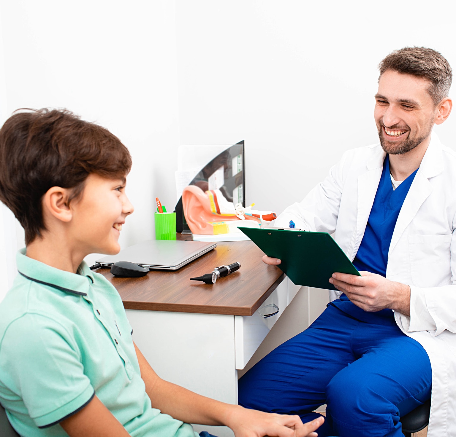 Boy visits a doctor audiologist.