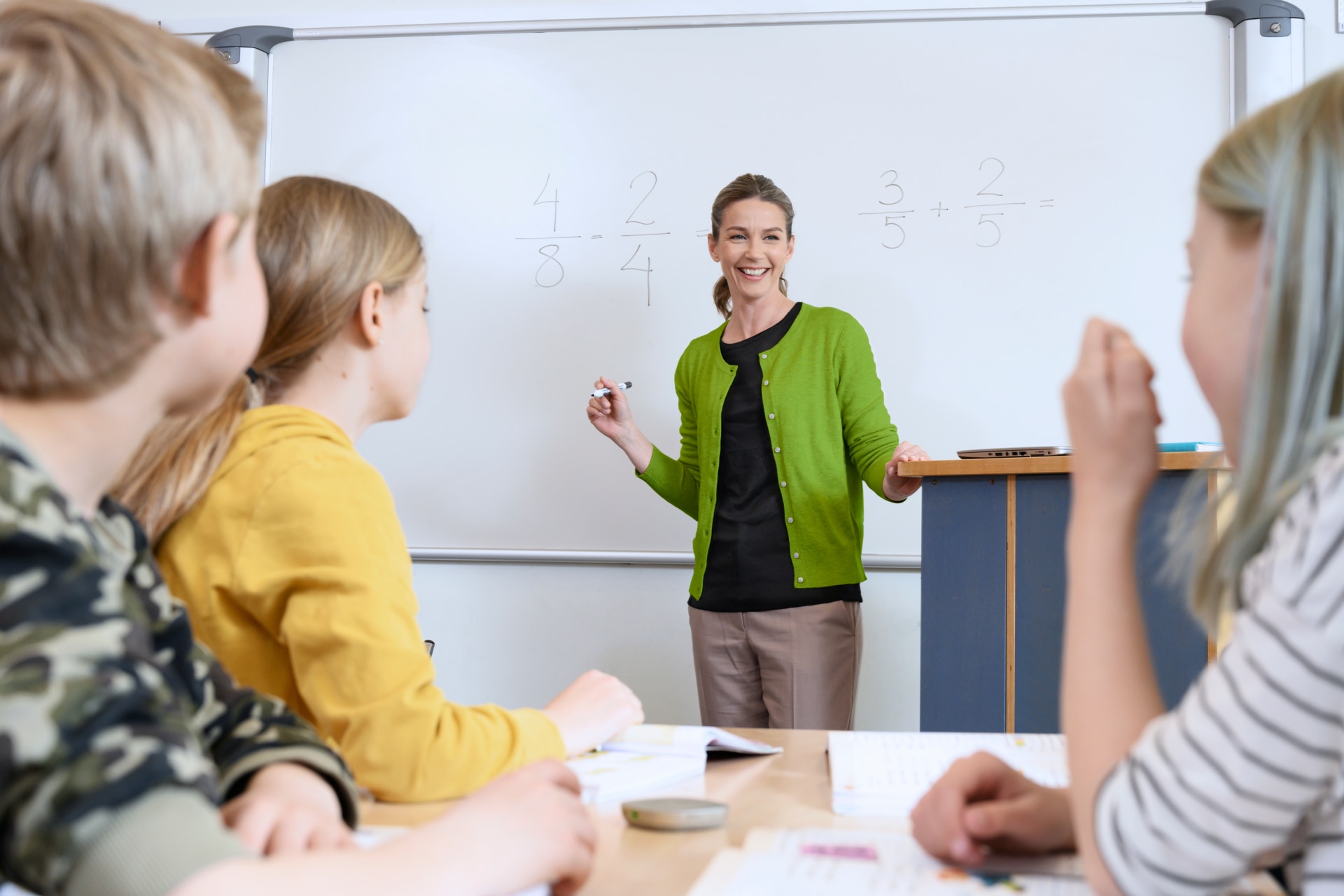 Teacher using Phonak Roger Microphone