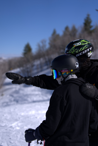 Professional freestyle skier Robin Gillon mentors 13-year-old Emmett Haaland on the slopes at Woodward Park City as part of the Hear My Life Ambassador Relay, inspiring the next generation of athletes with hearing loss.