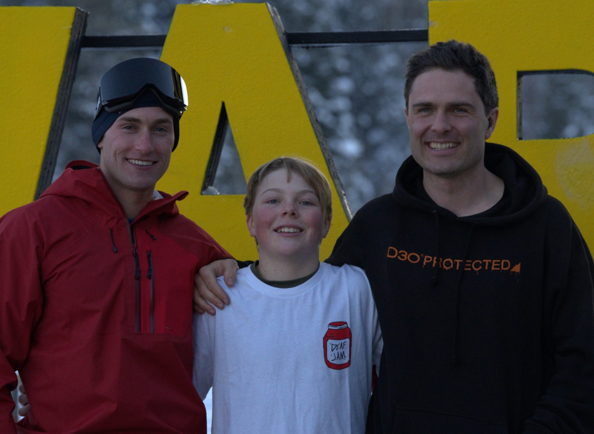 Olympian Aaron Small, 13-year-old Emmett Haaland, and professional freestyle skier Robin Gillon celebrate a successful day on the slopes at Woodward Park City as part of the Hear My Life Ambassador Relay, fostering mentorship and representation for athletes with hearing loss. Photo: Phonak