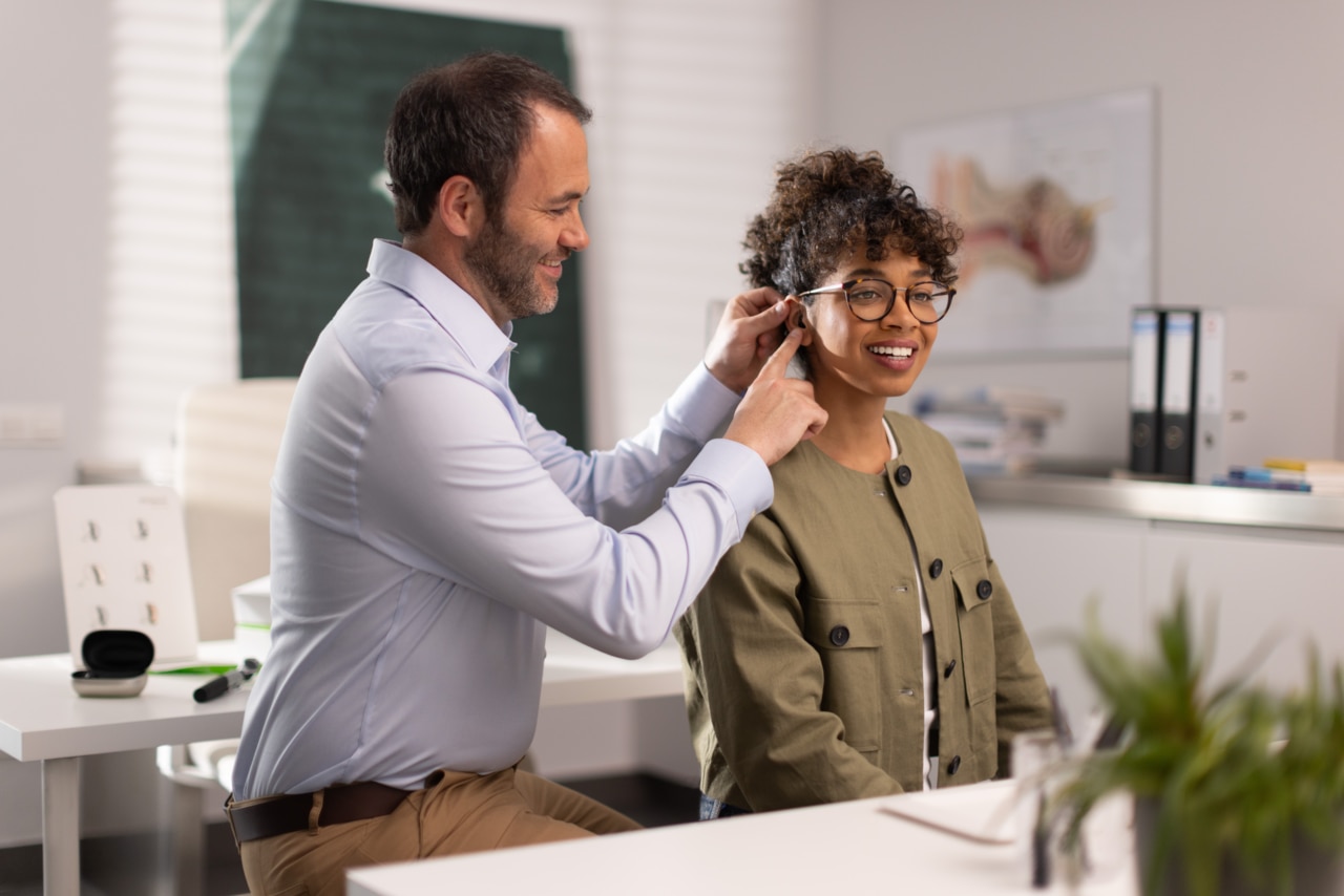 Hearing health care provider fitting Virto Infinio