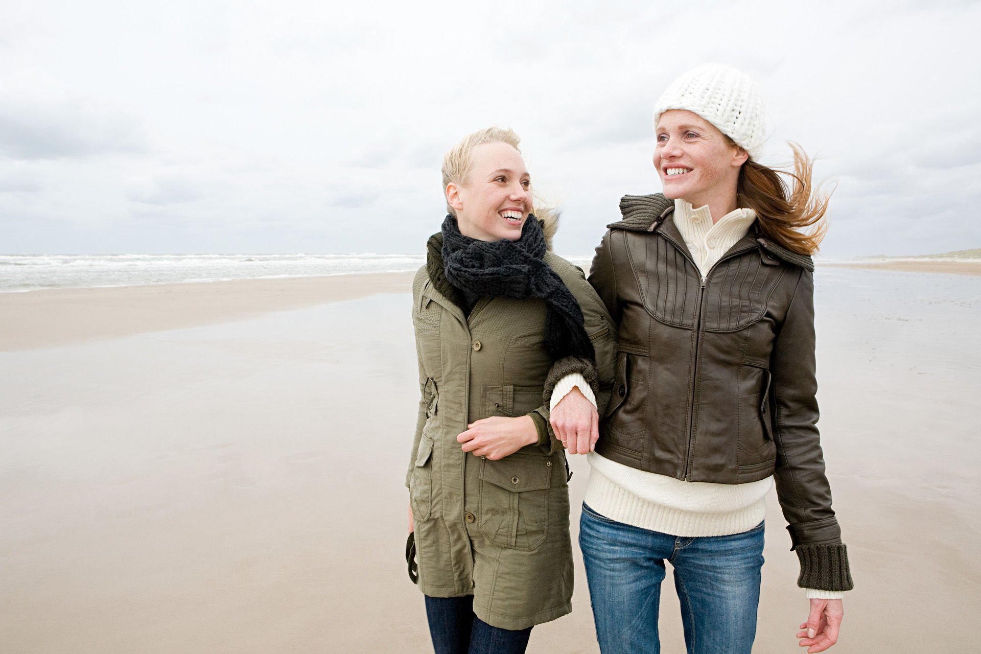 Female friends by the sea