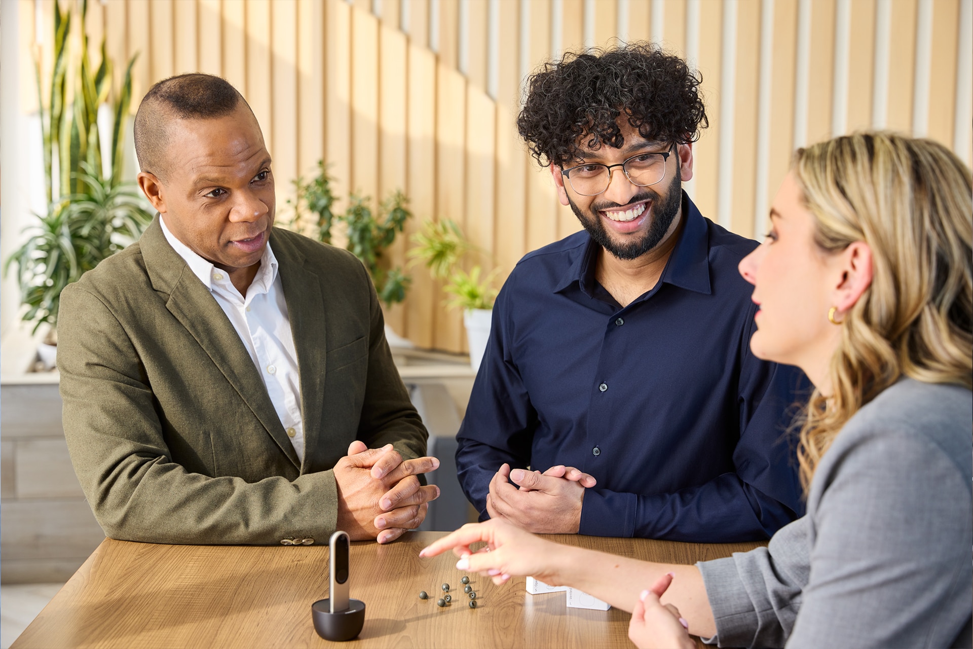 Clinic team reviewing hearing aid accessories