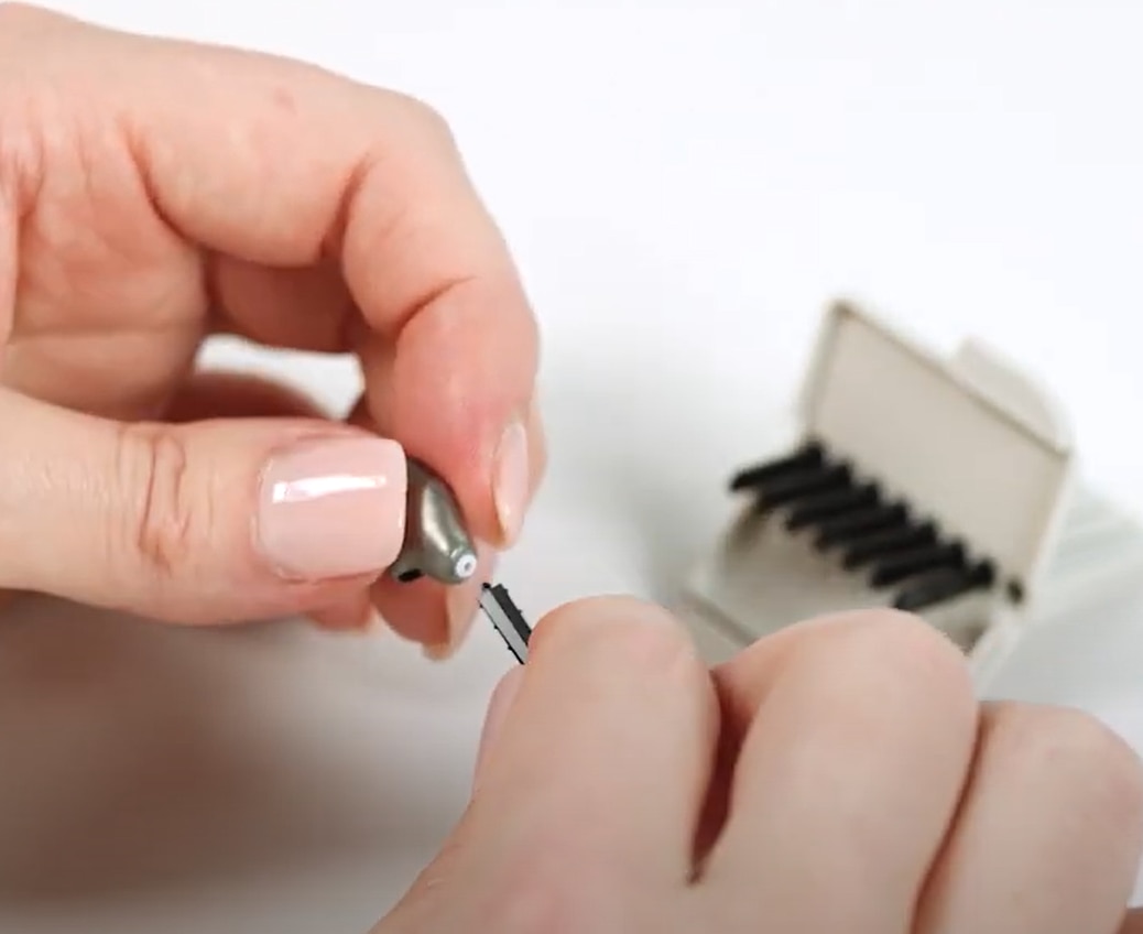 Cleaning RIC hearing aids