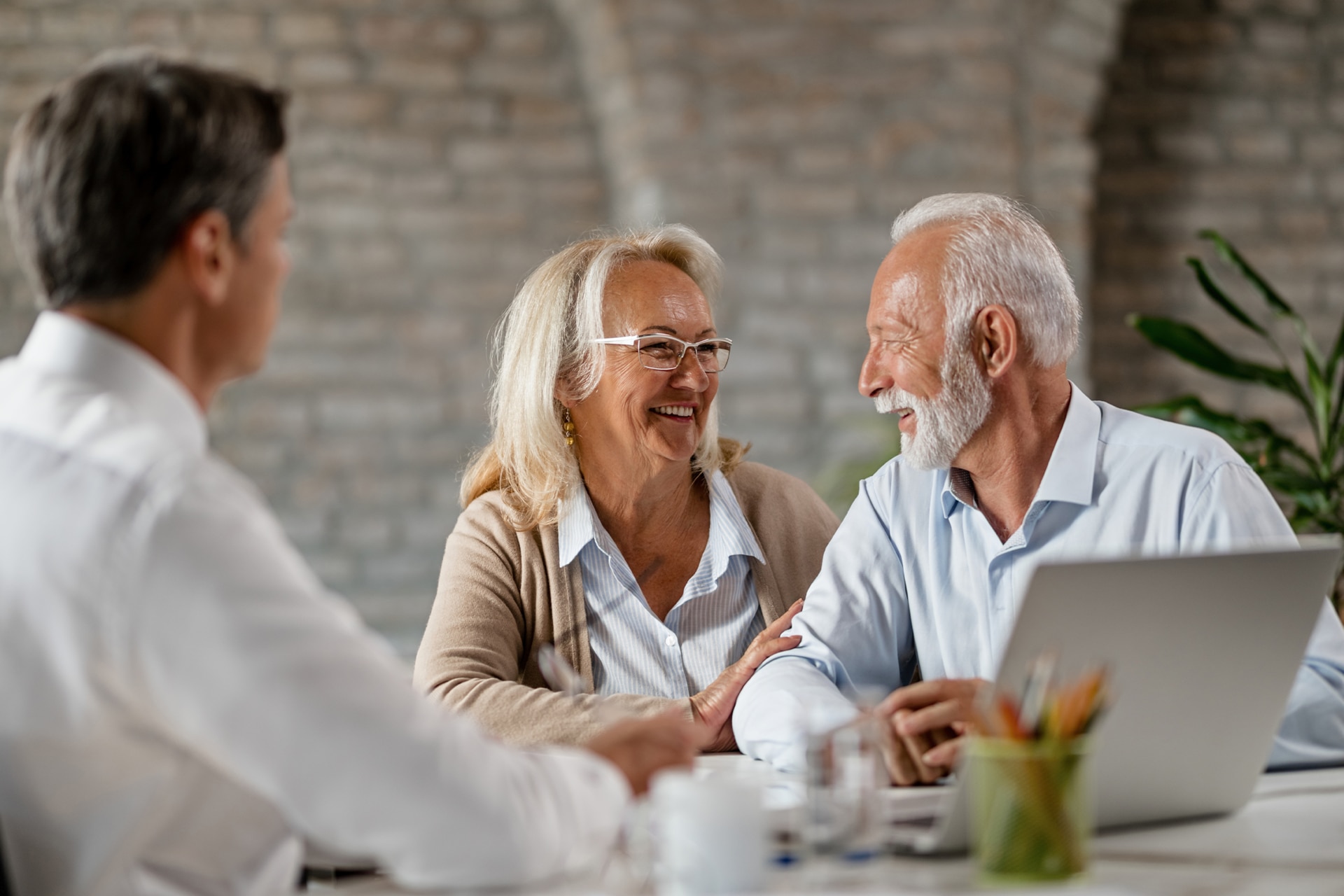 Senior couple consulting a hearing specialist