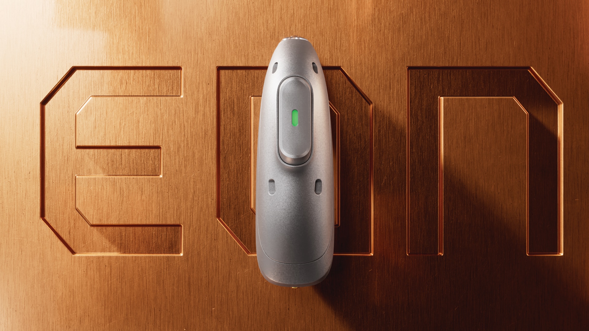 Phonak Phonak Audéo EON hearing aid shown beside precision measuring tool to illustrate it’s compact design.  