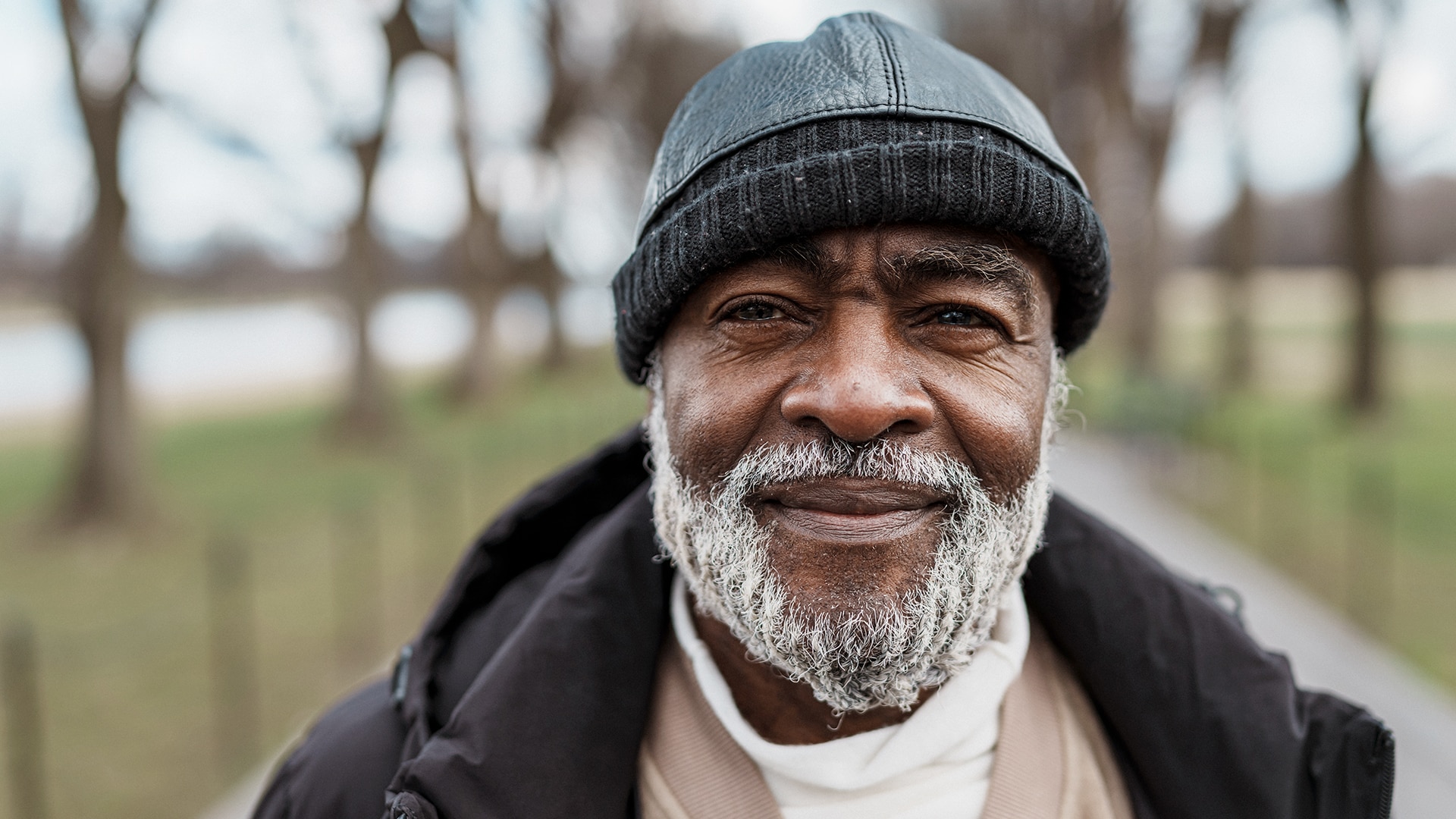 Military man at home working on laptop