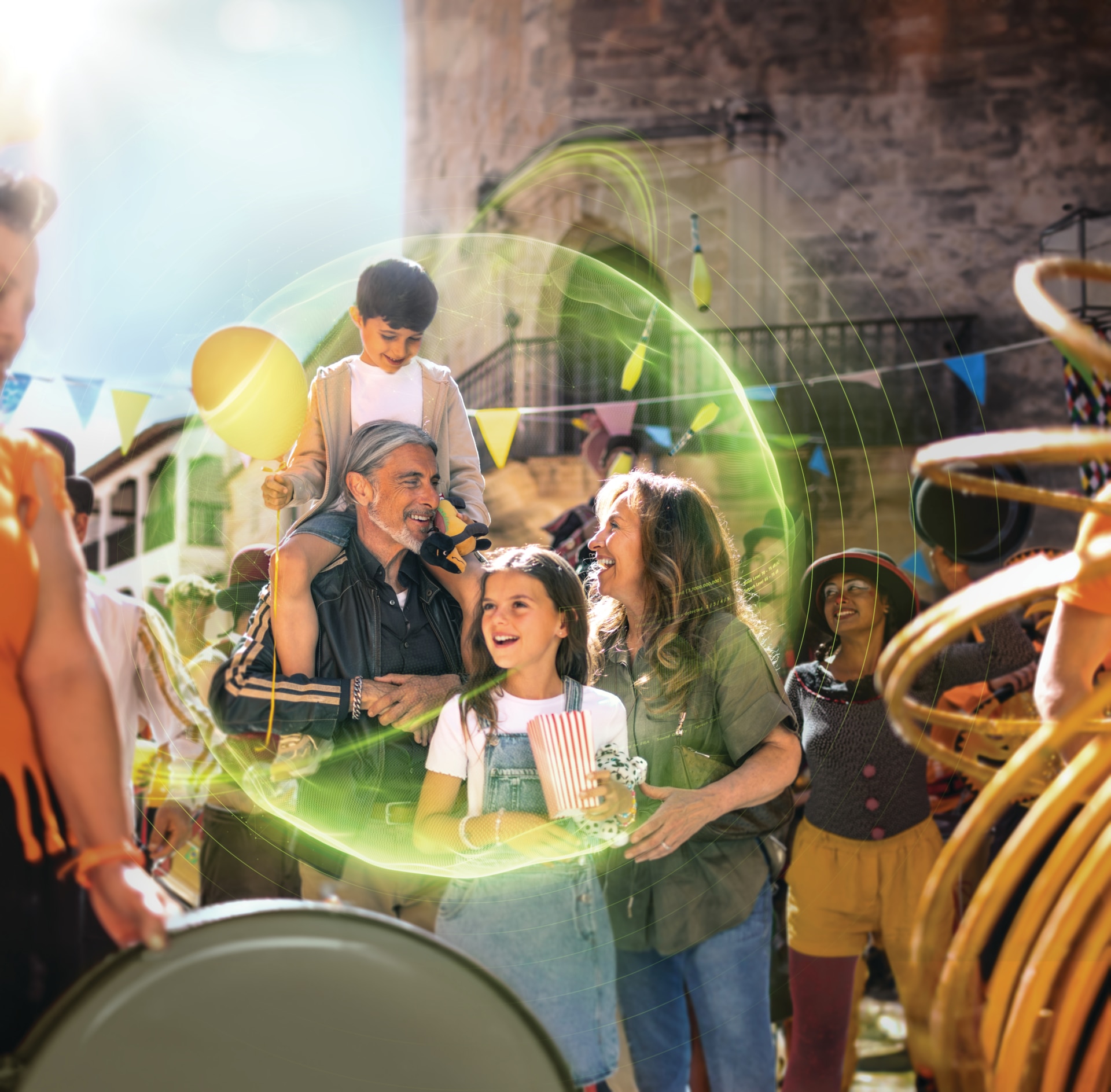 Family having fun together at a carnival, surrounded with a  symbolic green sound bubble