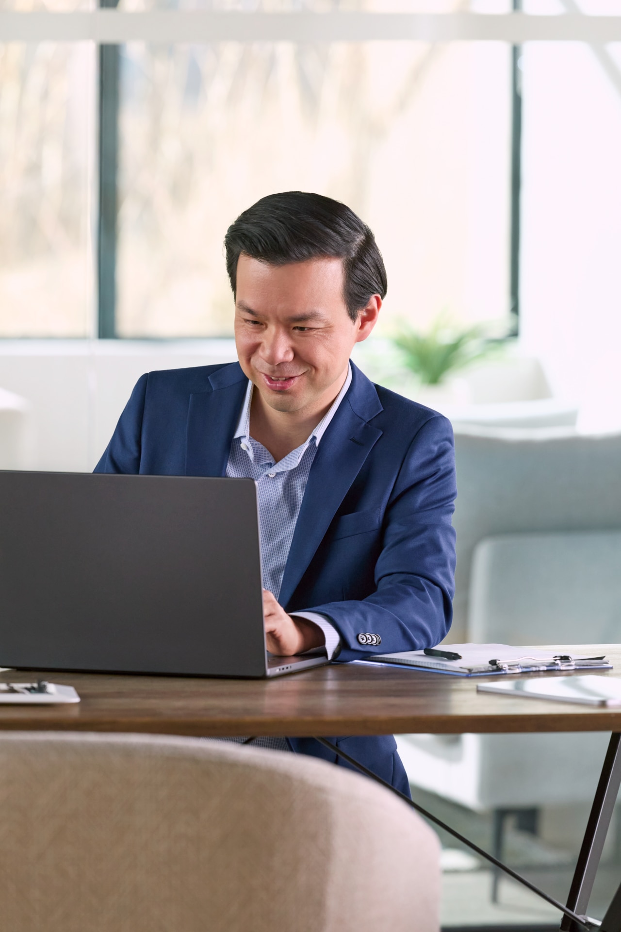 Businessman at work at a laptop