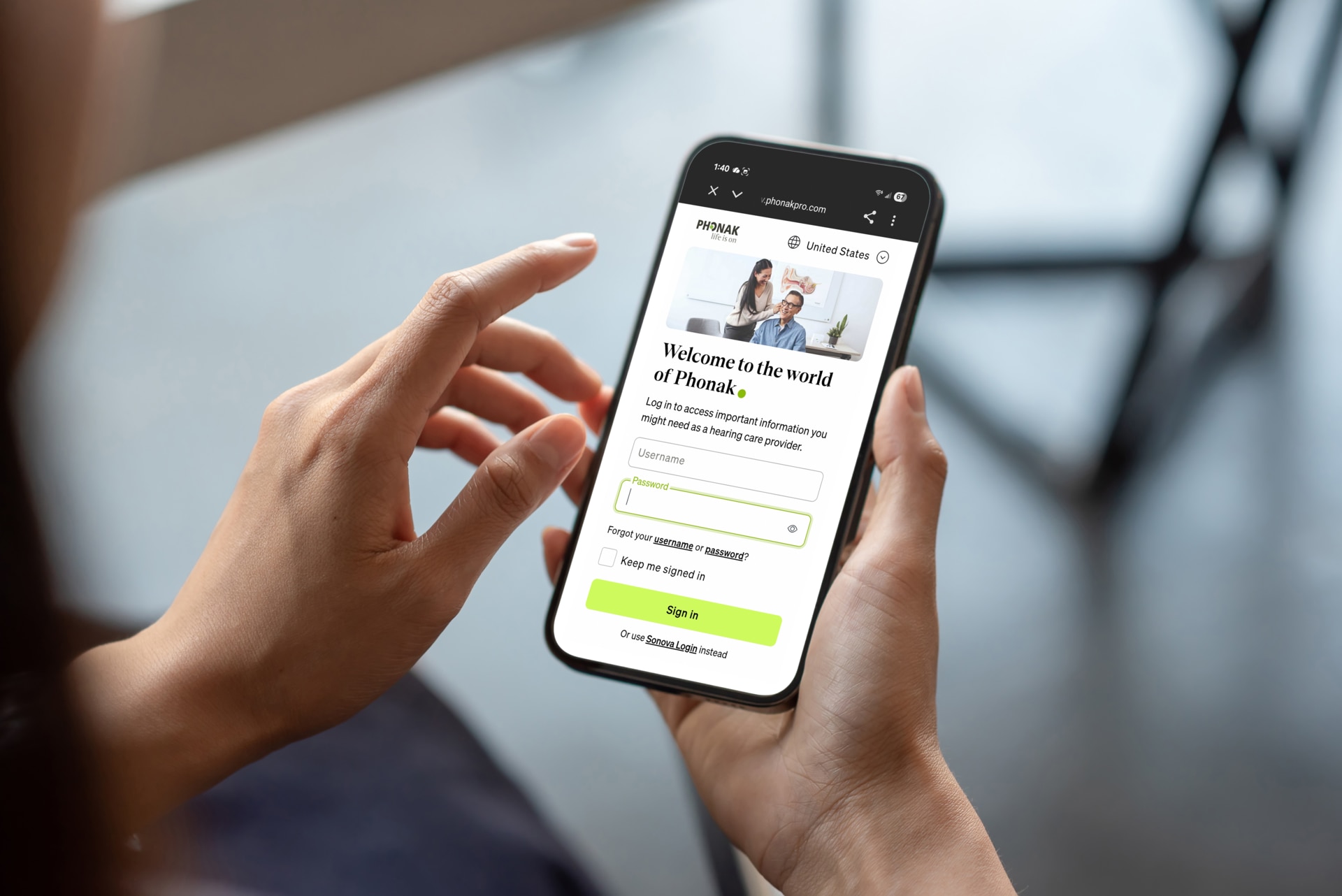 Close-up of a businessman hand holding a smartphone white screen is blank the background is blurred.Mockup.; Shutterstock ID 1979343674; purchase_order: -; job: -; client: -; other: