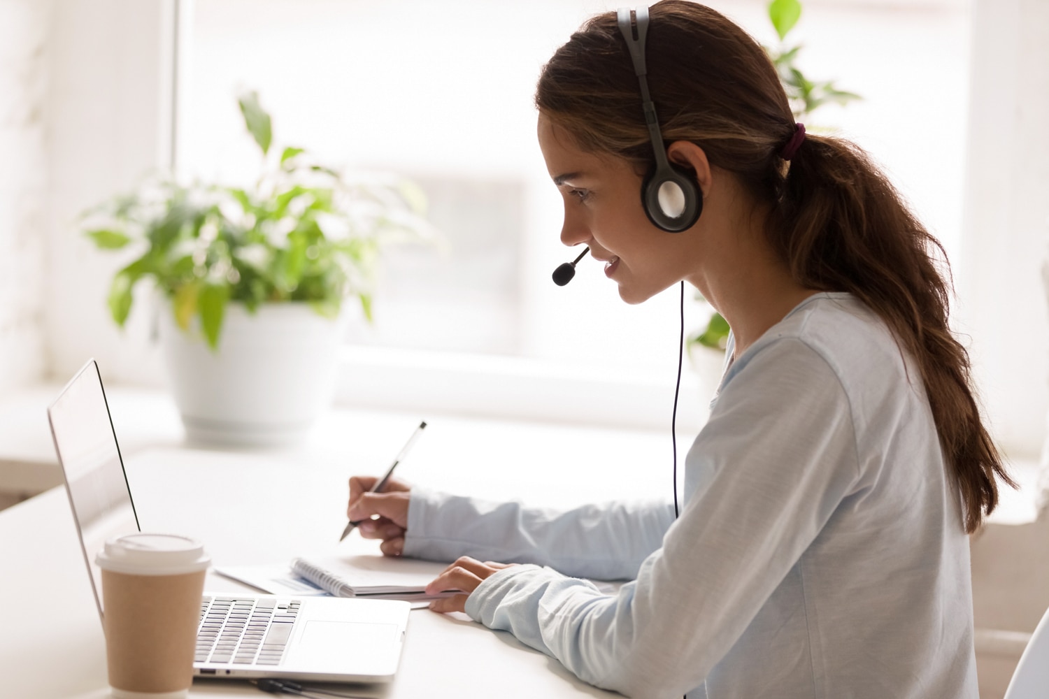 Womanwith headset on giving support